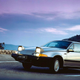 A photo of a Volvo 480 with pop-up headlamps.
